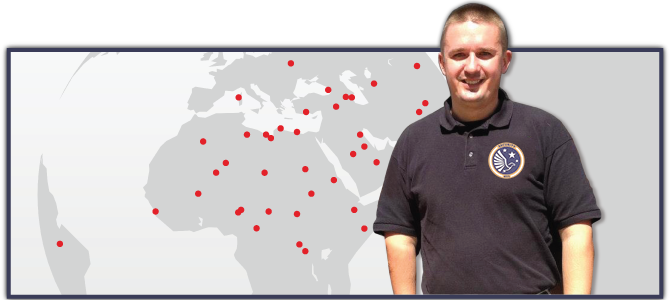 man standing in front of world map